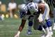 SAN DIEGO - SEPTEMBER 18: Defensive end Jacob Green #79 of the Seattle Seahawks gets into his stance during the game against the San Diego Chargers at Jack Murphy Stadium on September 18, 1988 in San Diego, California. The Chargers defeated the Seahawks