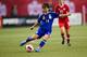VANCOUVER, BC - OCTOBER 28: Asuna Tanaka #14 of Japan kicks the ball during Women's International Soccer Friendly Series action against Canada on October 28, 2014 at BC Place Stadium in Vancouver, British Columbia, Canada. (Photo by Rich Lam/Getty Images