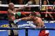 LAS VEGAS, NV - SEPTEMBER 13: Floyd Mayweather Jr. (L) avoids a right by Marcos Maidana in the 10th round of their WBC/WBA welterweight title fight at the MGM Grand Garden Arena on September 13, 2014 in Las Vegas, Nevada. Mayweather Jr. won by unanimous