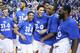 LEXINGTON, KY - MARCH 07: Tyler Ulis #3, Devin Booker #1, EJ Floreal #24 and Dominique Hawkins #25 of the Kentucky Wildcats celebrate following the game against the Florida Gators at Rupp Arena on March 7, 2015 in Lexington, Kentucky. Kentucky won 67-50