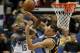 Jan 3, 2015; Minneapolis, MN, USA; Minnesota Timberwolves forward Shabazz Muhammad (15) drives to the basket against Utah Jazz center Rudy Gobert (27) in the third quarter at Target Center. The Jazz win 101-89. Mandatory Credit: Bruce Kluckhohn-USA TODAY