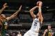 MEMPHIS, TN - DECEMBER 22: Marc Gasol #33 of the Memphis Grizzlies shoots against Rudy Gobert #27 of the Utah Jazz on December 22, 2014 at the FedExForum in Memphis, Tennessee. NOTE TO USER: User expressly acknowledges and agrees that, by downloading an