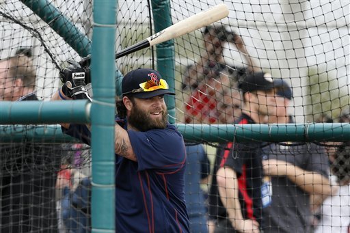 Mike Napoli returns after resting tight back
