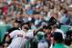 BOSTON, MA - MAY 17: Mike Napoli #12 of the Boston Red Sox makes a catch on a foul ball against the Detroit Tigers in the first inning at Fenway Park on May 17, 2014 in Boston, Massachusetts. (Photo by Jim Rogash/Getty Images)