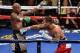 LAS VEGAS, NV - SEPTEMBER 13: Floyd Mayweather Jr. (L) avoids a right by Marcos Maidana in the 10th round of their WBC/WBA welterweight title fight at the MGM Grand Garden Arena on September 13, 2014 in Las Vegas, Nevada. Mayweather Jr. won by unanimous