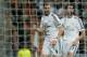 MADRID, SPAIN - MARCH 10: Karim Benzema (L) of Real Madrid CF celebrates scoring their third goal with teammate Alvaro Arbeloa (R) during the UEFA Champions League round of 16 second leg match between Real Madrid CF and FC Schalke 04 at Estadio Santiago