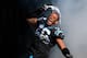 CHARLOTTE, NC - JANUARY 12: Greg Hardy #76 of the Carolina Panthers runs onto the field during player introductions against the San Francisco 49ers during the NFC Divisional Playoff Game at Bank of America Stadium on January 12, 2014 in Charlotte, North C