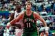 BARCELONA, SPAIN- AUGUST 6: Arvydas Sabonis #11 of Lithuania boxes out against David Robinson #5 of the United States during the 1992 Olympics on August 6, 1992 at the Palau Municipal d'Esports de badalona in Barcelona, Spain. The United States defeated L