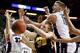 SEATTLE, WA - MARCH 22: Domantas Sabonis #11 of the Gonzaga Bulldogs fights for the rebound against Aaron White #30 of the Iowa Hawkeyes in the second half of the game during the third round of the 2015 NCAA Men's Basketball Tournament at KeyArena on Mar
