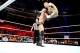 John Cena hits a hurricanrana on CM Punk in 2013.