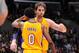 LOS ANGELES, CA - NOVEMBER 22: Pau Gasol #16 and Nick Young #0 of the Los Angeles Lakers embrace during a game against the Golden State Warriors on November 22, 2013 at STAPLES Center in Los Angeles, California. NOTE TO USER: User expressly acknowledges a