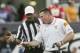 Jan 2, 2015; Jacksonville, FL, USA; Tennessee Volunteers head coach Butch Jones (right) discusses a call with a referee in the first quarter of their 2015 TaxSlayer Bowl game against the Iowa Hawkeyes at EverBank Field. Mandatory Credit: Phil Sears-USA TO