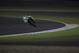 DOHA, QATAR - MARCH 27: Valentino Rossi of Italy and Movistar Yamaha MotoGP round sthe bend during the MotoGp of Qatar - Free Practice at Losail Circuit on March 27, 2015 in Doha, Qatar. (Photo by Mirco Lazzari gp/Getty Images)