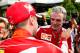 Ferrari team principal Maurizio Arrivabene congratulates Vettel after the race.