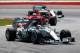 Lewis Hamilton leads Sebastian Vettel and Nico Rosberg early in the Malaysian Grand Prix.