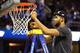 CLEVELAND, OH - MARCH 28: Karl-Anthony Towns #12 of the Kentucky Wildcats cuts down the net after defeating the Notre Dame Fighting Irish during the Midwest Regional Final of the 2015 NCAA Men's Basketball tournament at Quicken Loans Arena on March 28, 20