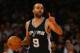 NEW YORK, NY - MARCH 17: Tony Parker #9 of the San Antonio Spurs in action against the New York Knicks during their game at Madison Square Garden on March 17, 2015 in New York City. NOTE TO USER: User expressly acknowledges and agrees that, by downloadi