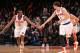 NEW YORK, NY - MARCH 19: Langston Galloway #2 and Alexey Shved #1 of the New York Knicks celebrate during a game against the Minnesota Timberwolves on March 19, 2015 at Madison Square Garden in New York City. NOTE TO USER: User expressly acknowledges and