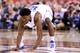 INDIANAPOLIS, IN - APRIL 04: Justise Winslow #12 of the Duke Blue Devils reacts by slapping the floor after a play in the second half against the Michigan State Spartans during the NCAA Men's Final Four Semifinal at Lucas Oil Stadium on April 4, 2015 in