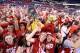 INDIANAPOLIS, IN - APRIL 04: Wisconsin Badgers fans celebrate after defeating the Kentucky Wildcats during the NCAA Men's Final Four Semifinal at Lucas Oil Stadium on April 4, 2015 in Indianapolis, Indiana. Wisconsin defeated Kentucky 71-64. (Photo by Str
