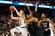 TAMPA, FL - APRIL 05: Madison Cable #22 of the Notre Dame Fighting Irish shoots against the South Carolina Gamecocks in the second half during the NCAA Women's Final Four Semifinal at Amalie Arena on April 5, 2015 in Tampa, Florida. (Photo by Brian Blan