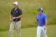 GULLANE, SCOTLAND - JULY 17: Rory McIlroy of Northern Ireland and Jordan Spieth of the United States walk along the fairway ahead of the 142nd Open Championship at Muirfield on July 17, 2013 in Gullane, Scotland. (Photo by Stuart Franklin/Getty Images)
