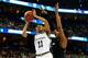 TAMPA, FL - APRIL 05: Brianna Turner #11 of the Notre Dame Fighting Irish shoots against Alaina Coates #41 of the South Carolina Gamecocks in the first half during the NCAA Women's Final Four Semifinal at Amalie Arena on April 5, 2015 in Tampa, Florida.