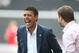 MILTON KEYNES, ENGLAND - APRIL 22: Sky TV pundit Chris Kamara talks to MK Dons manager Karl Robinson prior to the npower League One match between MK Dons and Huddersfield Town at Stadium mk on April 22, 2011 in Milton Keynes, England. (Photo by Pete Norto