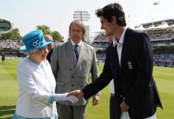 LONDON, UNITED KINGDOM - JULY 18:  Queen Elizabeth II shakes hands with England captain Alastair Cook, watched by ECB Chairman Giles Clarke (centre), ahead of the first day of the second test between England and Australia at Lord's Cricket Ground on July 