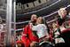 CM Punk and AJ Lee attend a Chicago Blackhawks game.