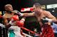 De La Hoya put Mayweather on the ropes, but never landed a big punch.