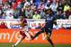 Apr 26, 2015; Harrison, NJ, USA; Los Angeles Galaxy midfielder Juninho (19) defends against a shot by New York Red Bulls forward Peguy Luyindula (8) during second half at Red Bull Arena. Final score 1-1. Mandatory Credit: Noah K. Murray-USA TODAY Sports