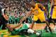BOSTON, MA - FEBRUARY 9: Kobe Bryant #24 of the Los Angeles Lakers helps up Rajon Rondo #9 of the Boston Celtics on February 9, 2012 at the TD Garden in Boston, Massachusetts. NOTE TO USER: User expressly acknowledges and agrees that, by downloading and o