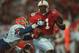 Lawrence Phillips breaks a tackle in Nebraska's 1996 Fiesta Bowl victory over Florida.