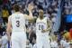 NEW ORLEANS, LA - APRIL 25: Teammates Omer Asik #3 high fives Quincy Pondexter #20 of the New Orleans Pelicans during Game Four of the Western Conference Quarterfinals against the Golden State Warriors during the NBA Playoffs at Smoothie King Center on Ap