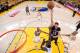 OAKLAND, CA - APRIL 20: Anthony Davis #23 of the New Orleans Pelicans shoots over Draymond Green #23 and Andrew Bogut #12 of the Golden State Warriors in the third second half during the first round of the 2015 NBA Playoffs at ORACLE Arena on April 20, 2