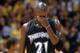 LOS ANGELES - MAY 1: Kevin Garnett #21 of the Minnesota Timberwolves wipes his eyes during game six of the Western Conference Quarterfinals against the Los Angeles Lakers at Staples Center on May 1, 2003 in Los Angeles, California. The Lakers won 101-85.