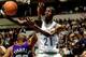 MINNEAPOLIS - JANUARY 24: Kevin Garnett #21 of the Minnesota Timberwolves goes in for a reverse layup against Wayman Tisdale #23 of the Phoenix Suns on January 24, 1996 during an NBA game at the Target Center in Minneapolis, Minnesota. The Suns defeat