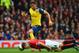 MANCHESTER, ENGLAND - MAY 17: Phil Jones of Manchester United heads the ball clear of Olivier Giroud of Arsenal during the Barclays Premier League match between Manchester United and Arsenal at Old Trafford on May 17, 2015 in Manchester, England. (Photo