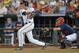 Omaha, NE - JUNE 23: Shortstop Daniel Pinero #22 of the Virginia Cavaliers singles in a run against the Vanderbilt Commodores in the fifth inning during game one of the College World Series Championship on June 23, 2014 at TD Ameritrade Park in Omaha, Ne