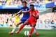 LONDON, ENGLAND - MAY 10: Raheem Sterling of Liverpool is challenged by Filipe Luis of Chelsea during the Barclays Premier League match between Chelsea and Liverpool at Stamford Bridge on May 10, 2015 in London, England. (Photo by Clive Rose/Getty Image
