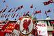 ISTANBUL, TURKEY - MAY 25: A supporter of Liverpool FC is seen with a flag draped over their shoulders in Taxim Square before the Champions League final on May 25, 2005 in Istanbul, Turkey. A massive security operatin has been mounted by Turkish police t