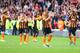 HULL, ENGLAND - MAY 24: Michael Dawson (2nd R) and Hull City players applaud supporters after relegated from the Premier League during the Barclays Premier League match between Hull City and Manchester United at KC Stadium on May 24, 2015 in Hull, Englan