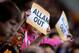 HULL, ENGLAND - MAY 24: Hull City supporters hold banners to criticize owner Assem Allam during the Premier League after the Barclays Premier League match between Hull City and Manchester United at KC Stadium on May 24, 2015 in Hull, England. (Photo by