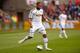 Swansea's Ashley Williams said he would prefer to concentrate on the Premier League rather than playing in the Europa League.