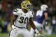 SEATTLE, WA - NOVEMBER 08: Linebacker Myles Jack #30 of the UCLA Bruins defends against the Washington Huskies on November 8, 2014 at Husky Stadium in Seattle, Washington. (Photo by Otto Greule Jr/Getty Images)