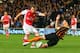 HULL, ENGLAND - MAY 04: Aaron Ramsey of Arsenal (L) scores their second goal as Robbie Brady of Hull City attempts to block during the Barclays Premier League match between Hull City and Arsenal at KC Stadium on May 4, 2015 in Hull, England. (Photo by A