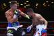 NEW YORK, NY - MAY 29: Chris Algieri punches Amir Khan during their Welterweight bout at Barclays Center of Brooklyn on May 29, 2015 in New York City. (Photo by Al Bello/Getty Images)