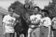 Mickey Taylor, left, and Karen Taylor, owners of Seattle Slew, stand by their horse with at the Belmont Park stables.