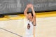 OAKLAND,CA - JUNE 4: Stephen Curry #30 of the Golden State Warriors gets the crowd pumped up in overtime against the Cleveland Cavaliers at the Oracle Arena During Game one of the 2015 NBA Finals on June 4, 2015 in Oakland, California NOTE TO USER: User